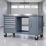 Slate gray mobile workbench with stainless steel top in a garage