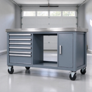 Slate gray mobile workbench with stainless steel top in a garage