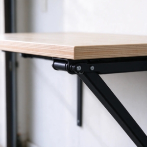 Black steel folding bracket under the birch top