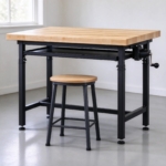 Workbench lowered to sitting height in a home studio