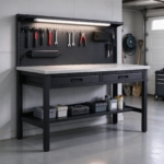 Black steel workbench with pegboard and LED light in a garage