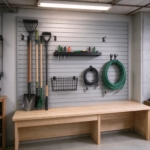 Slatwall panels in a basement workshop above a wooden counter